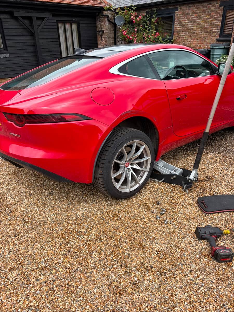 Mobile tyre fitting on a Jaguar F-Type on a driveway near Gravesend