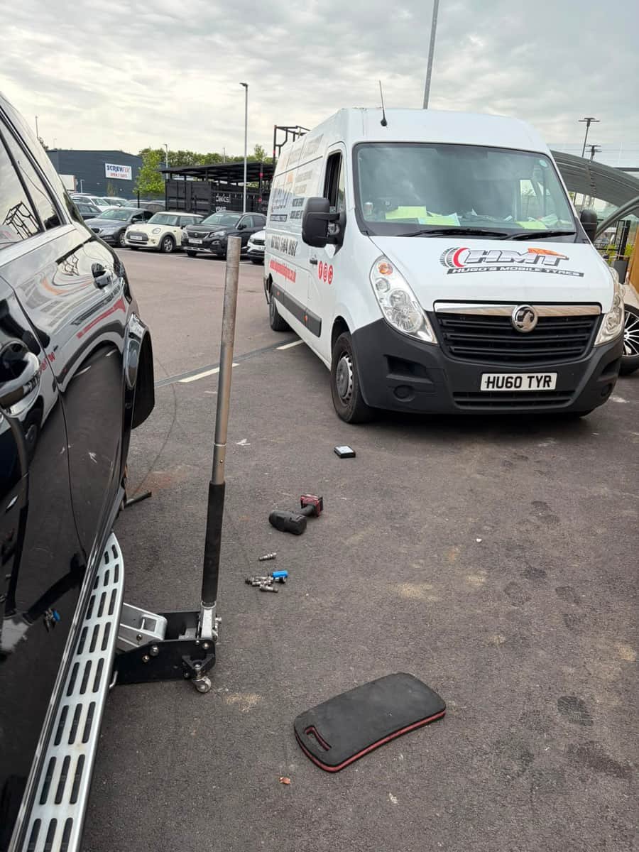 Hugo's Mobile Tyres van on a mobile tyre fitting callout on a residential road in Bexley